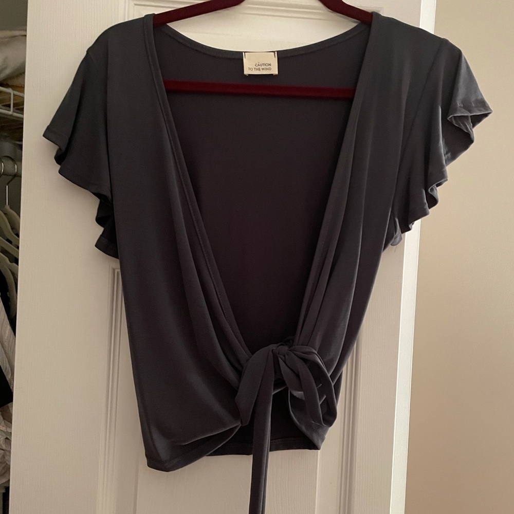 Grey t shirt that ties on the side. Never worn